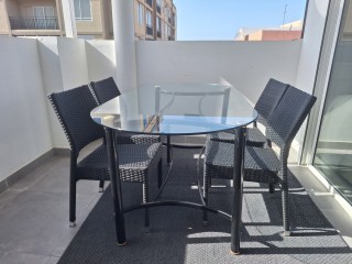Mesa cristal y 4 sillas