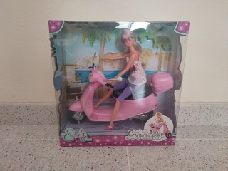 Muñeca Stella con moto scooter rosa - Nuevo y sin estrenar - Ideal para regalar en Reyes